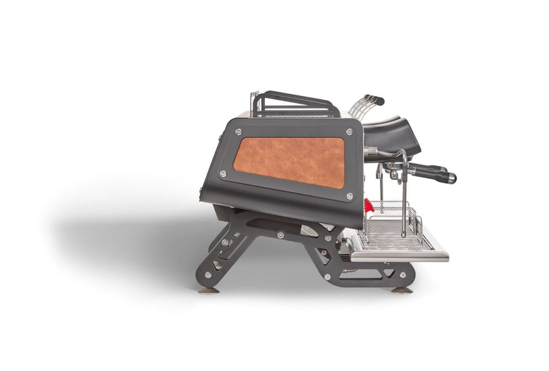 Bezzera commercial espresso machine installed on a cafe bench.